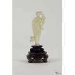 A Translucent Qing Dynasty Lavender Jade Figure of a Lady, c. 1644-1911