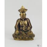 A Gilt Bronze Tibetan Sculpture of a Lama, c. 19th Century