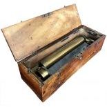 An early key-wind Swiss Cylinder
Musical Box in a simple case.