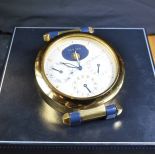 Table alarm clock with full calendar and seconds in the middle. Signed CARTIER. Very good condition.