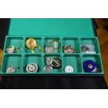 Box with gold and enamel clock parts and casings 5 pieces.