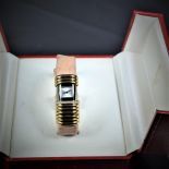 Jewelry watch CARTIER made of three colored gold, with diamonds. Folding clasp mechanism. With box.