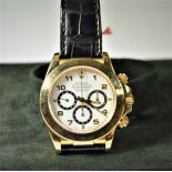  ROLEX  Daytona. 18ct gold. Diameter 40mm. Folding clasp. 2 wristbands. Like new. Box and papers