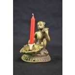 Brass candle stick, monkey with betel nuts, height   13,0 cm, India, ca 1900