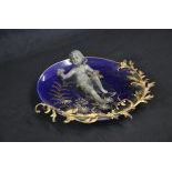 Ceremonial dish, cobalt blue foundation with gilded bronze stand formed like a flower twine on the...