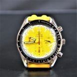 Automatic chronograph OMEGA Schumacher. Yellow clock face and wristband with display device.