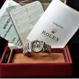  Two-tone wristwatch ROLEX. Clock face with diamonds und sapphire glass. Ø 27mm. With box and...