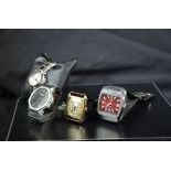  Lot with 4 Wristwatches. One TAG HEUER Quartz, one automatic TISSOT, one LONGINES Quartz and gilded...