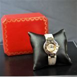 Steel and gold wristwatch CARTIER. Butterfly clasp. With box.