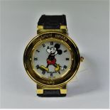  Mickey Mouse GERALD GENTA watch in 18ct gold. Clasp in gold, dial in mother of pearl. Diameter 35...