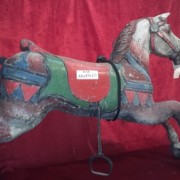 White wooden carousel horse, gray and red