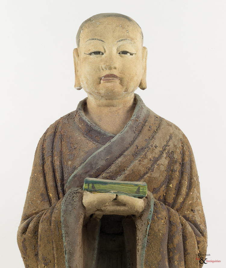 A Painted Clay Ming Dynasty Sculpture of a Luohan, c. 1368-1644