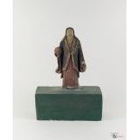 A Painted Clay Ming Dynasty Temple Wall Relief of a Foreign Visitor, c. 1368-1644