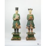 Two Green and Amber Glazed Ming Dynasty Pottery Sculptures of Attendants, c. 1368-1644,