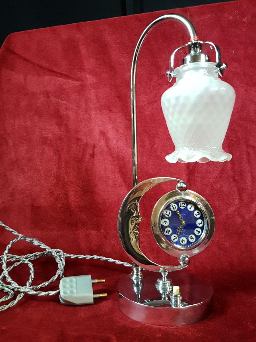  Really rare Art Déco chromed lamp with pocket watch. Enameled clock face. Minute repetition on...