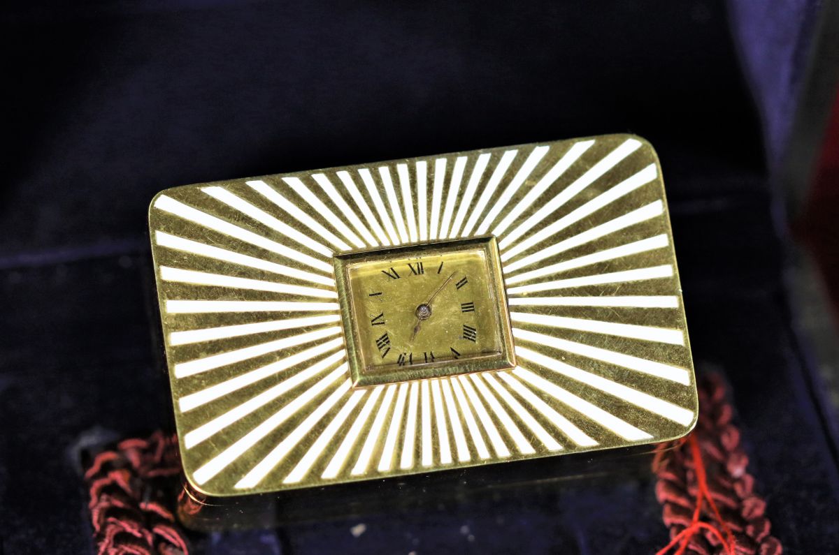  Gilded silver and enamel office clock with music by Reuge. Dated  4. August 1919th with box....