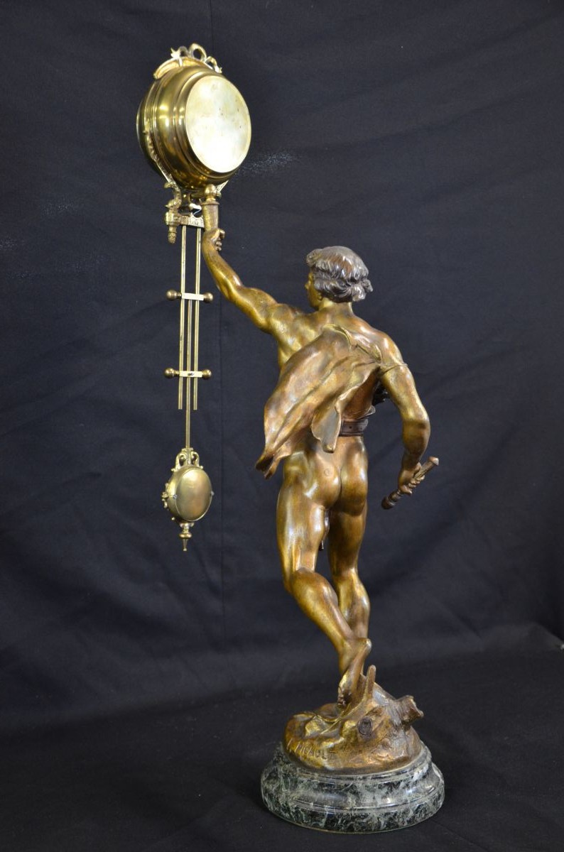  Rare pendulum with 8 day striking mechanism, flawless condition, bronze, an Adonis holds the free...