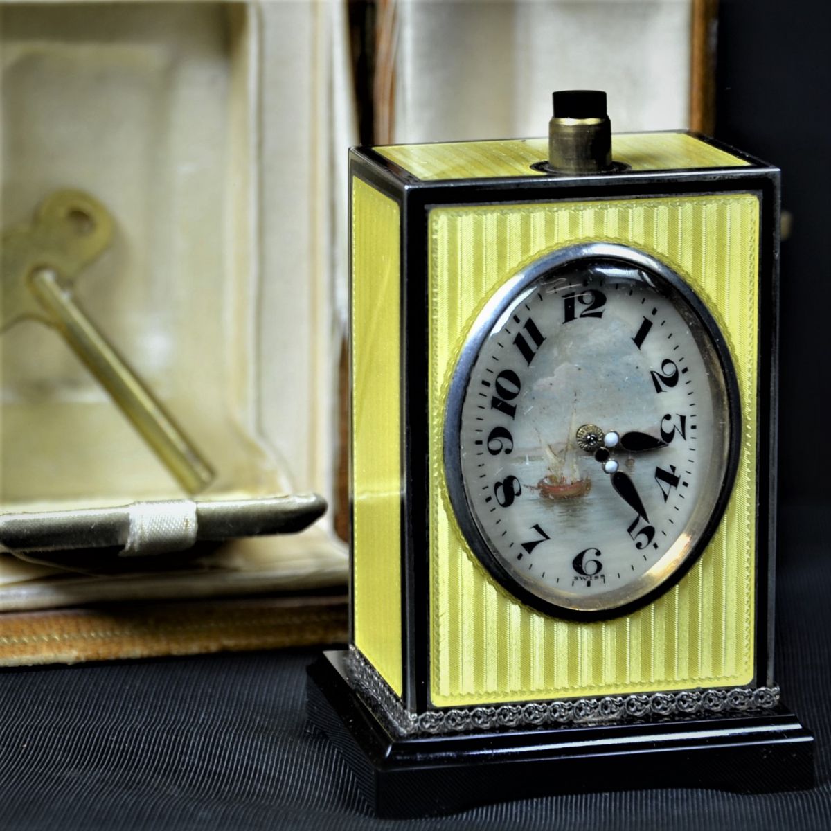  Travel Clock  MATHEY TISSOT  in original case. Gilded 935 silver. Enamelled and with Guilloche...