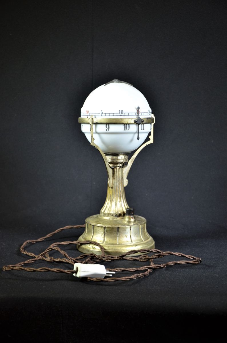  Rare lamp watch with alarm clock in Art Déco Style. Rotating lamp bowl with hours and minutes. Good...