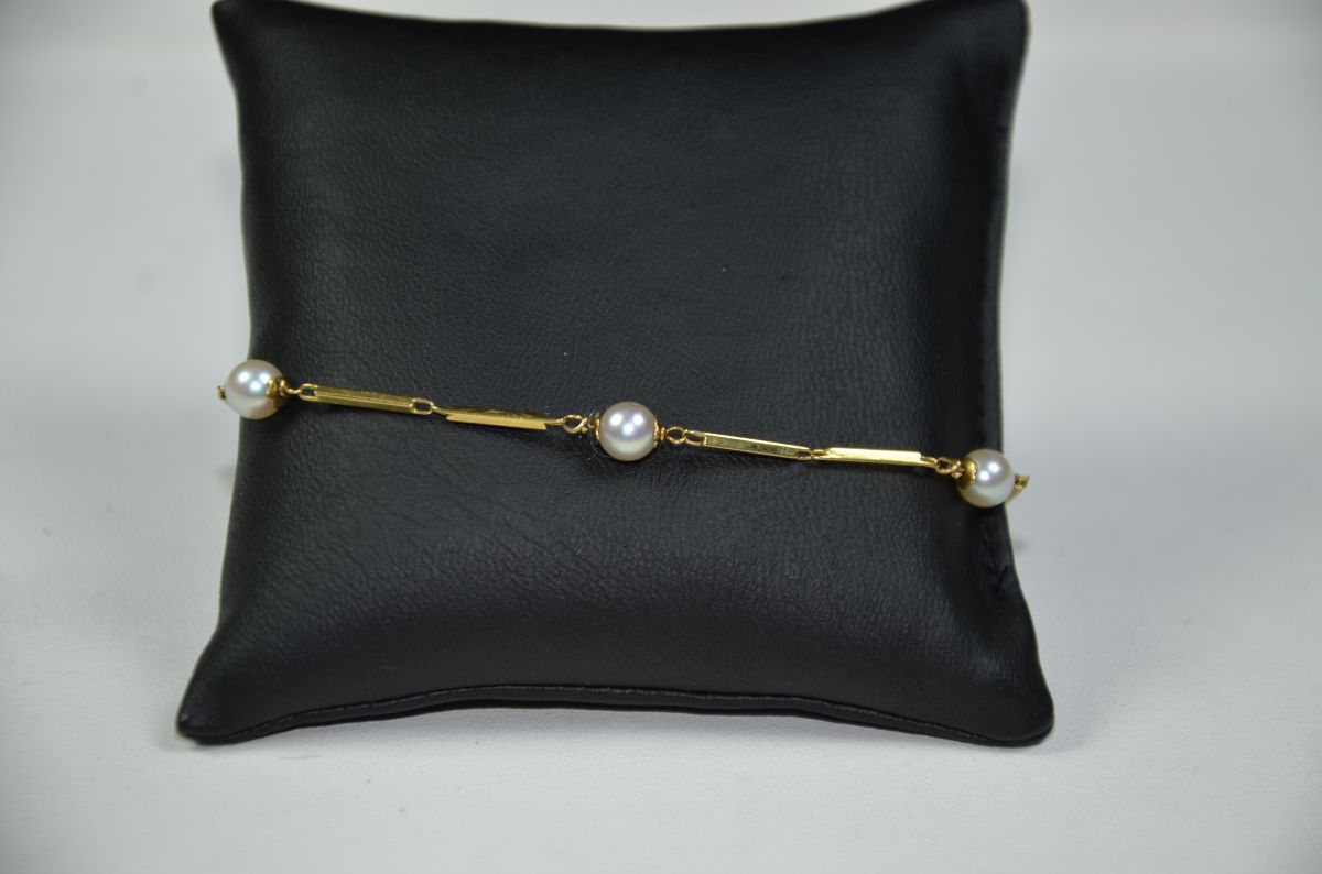 Petit bracelet en or jaune 18ct et perles poids brut  4 g, 21cm.