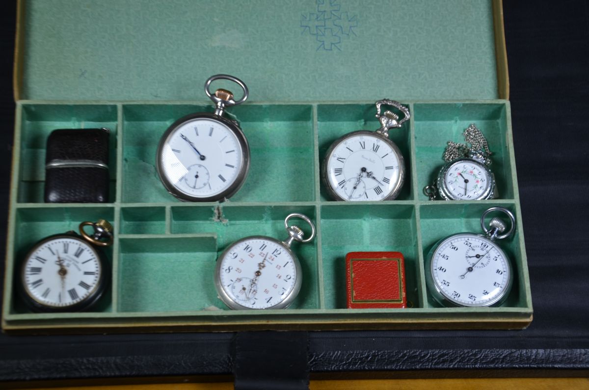  Box with 8 watches, one of which, Ermeto, Movado, Roskopf. One meter and three silver pocket...