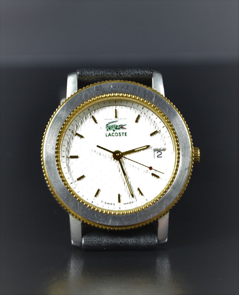 Quartz wristwatch LACOSTE made of steel and 18ct gold. Very good condition.