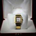  Automatic wristwatch CARTIER Santos. Completely made of 18ct gold. With calendar and box. Very good...