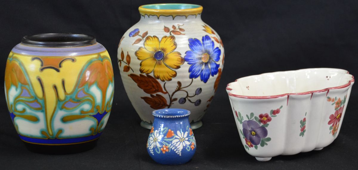  Collection of four ceramic pieces, two vases, one small vase and one window box. Height   from 6,5...