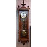  Studio regulator walnut wood clock. Enameled clock face and second hand in the middle. Signed...