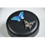 2 brooches in butterfly form