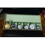 Box with six watches, three of which silver