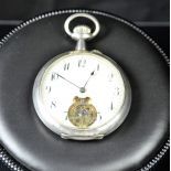 silver pocket watch. Visible balance at 6 h.  Enameled clock face. Good condition.